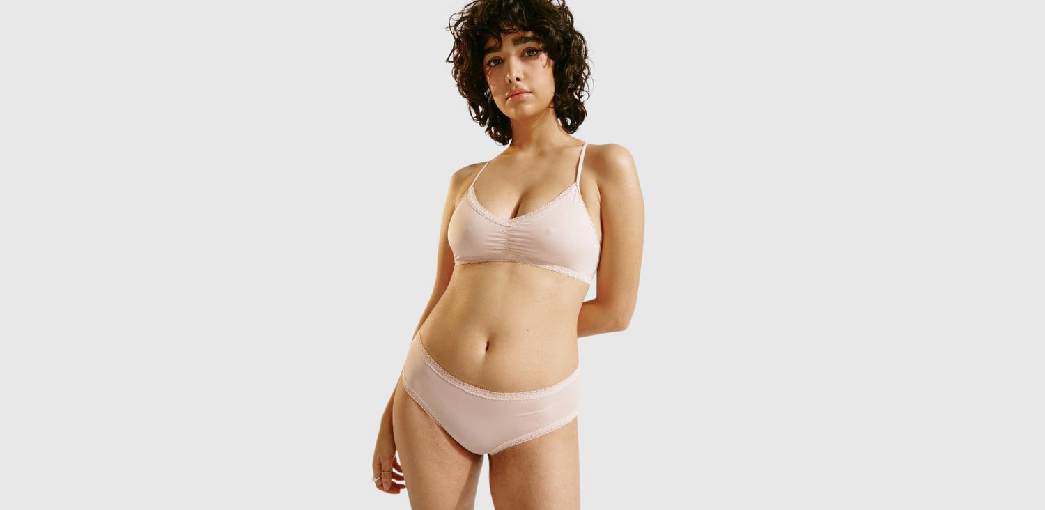 A woman is shown in nude-coloured underwear